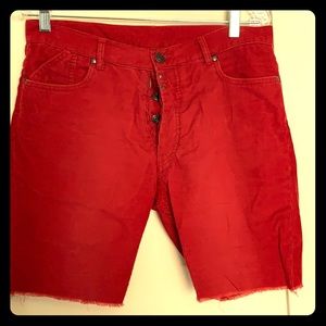 Red corduroy cutoff shorts